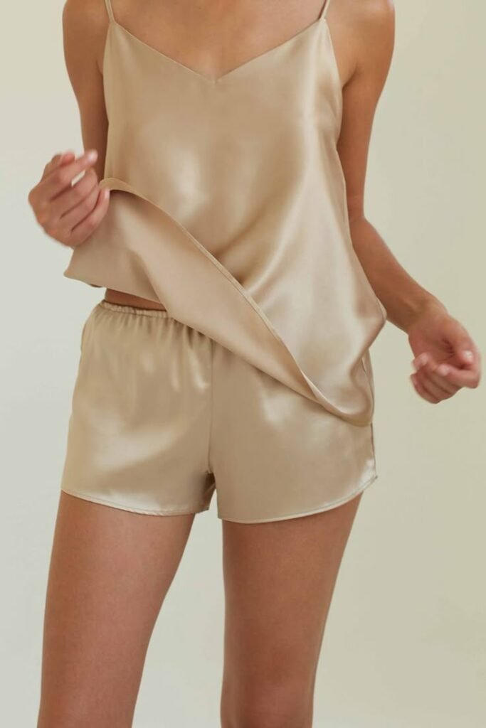Deep dusk-colored satin cami and shorts lounge set with soft, flowing drape.
